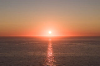 Aerial shot of the Sunset over La Jolla Shores La Jolla Farms Black’s Beach and Torrey Pines