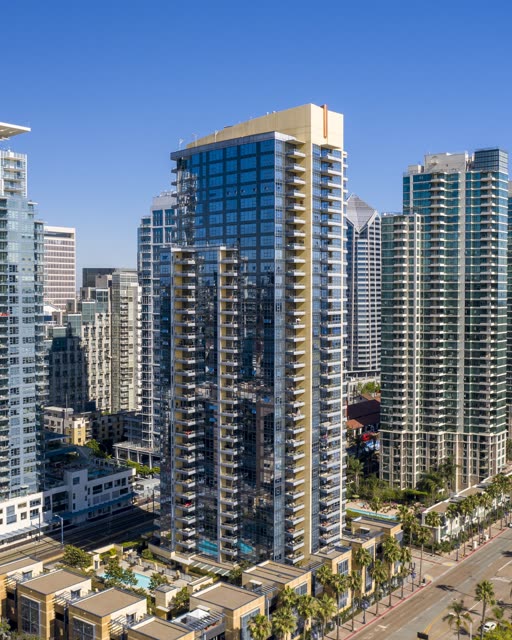 Aerial view of the downtown streets, the skyline and palm trees at Waterfront.