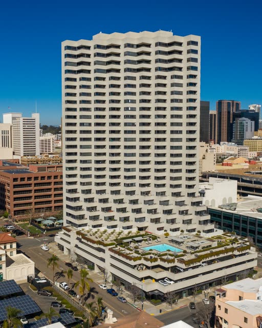 Aerial view of the downtown streets, the skyline and palm trees at San Diego Marina.