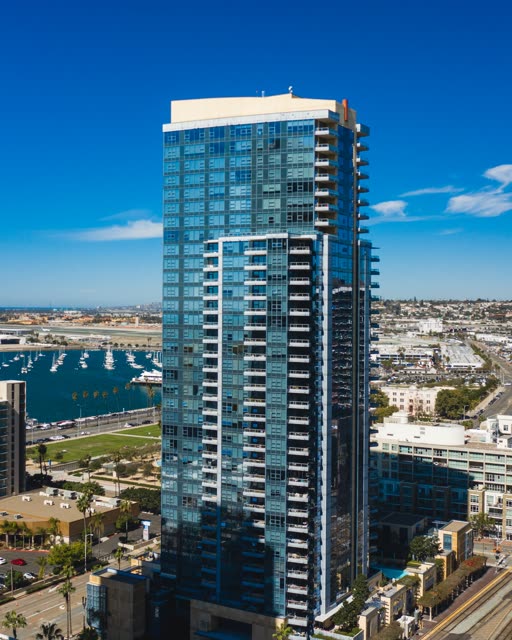 Aerial view of the downtown streets, boats and palm trees at Waterfront.