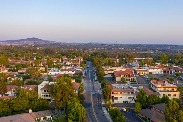 Aerial view of a residential street, homes and the buildings at Covenant.