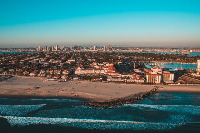 Helicopter shot of the Hotel Del Coronado and the beach – Sunset | Aerial Photo – 1