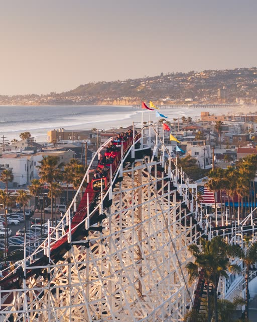 Elevated view of the beach, the surf and the pier in Mission Bay.