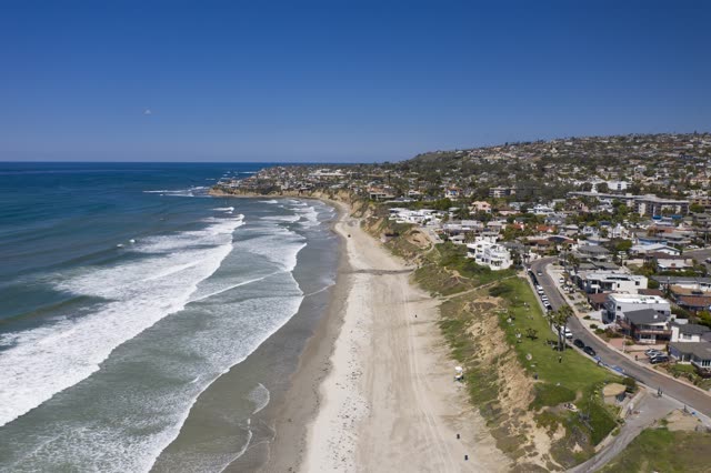 Aerial view of the beach, the surf and the ocean in Pacific Beach.