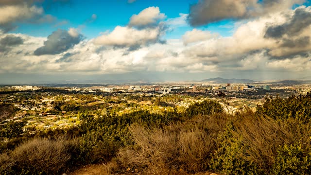 Elevated view of the country inland, the skyline and homes at Mount Soledad.