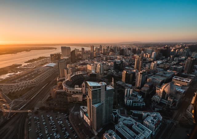 Aerial view of the downtown streets, the skyline and the bay at East Village.