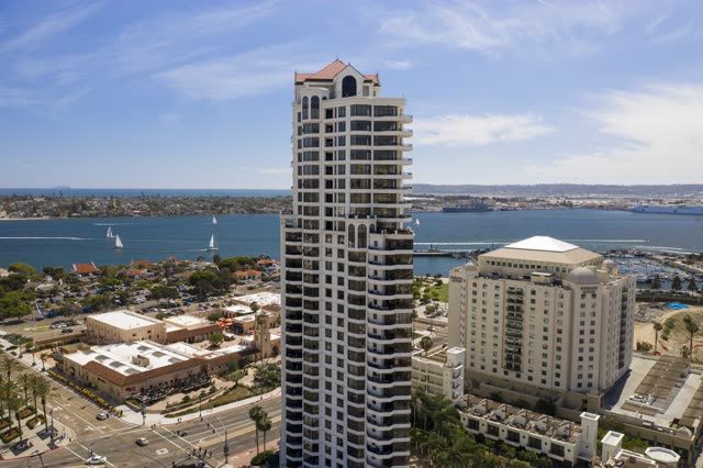 Aerial view of the downtown streets, boats and palm trees at San Diego Marina.