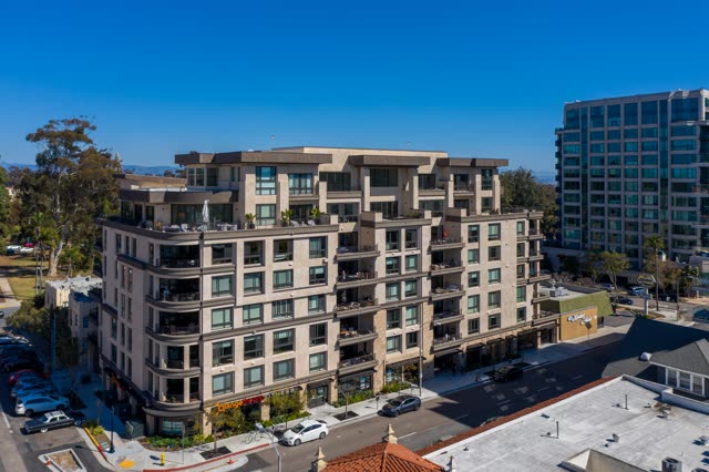 Low aerial view of the downtown streets, the buildings and the city at Bankers Hill.