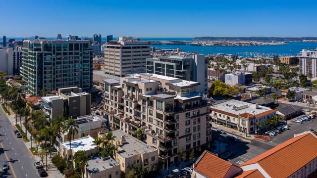 Aerial view of the downtown streets, the skyline and boats at Bankers Hill.