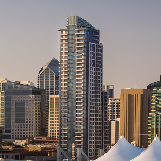 Low aerial view of the downtown streets, the skyline and the buildings at Embarcadero.