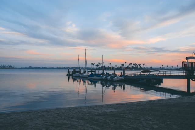 The beach, the pier and boats in Mission Bay.