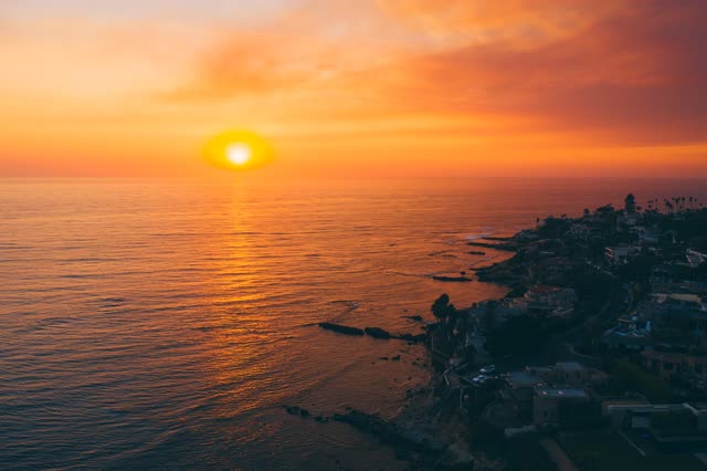 Stunning Orange Summer Sunset over Bird Rock La Jolla | Drone Photo