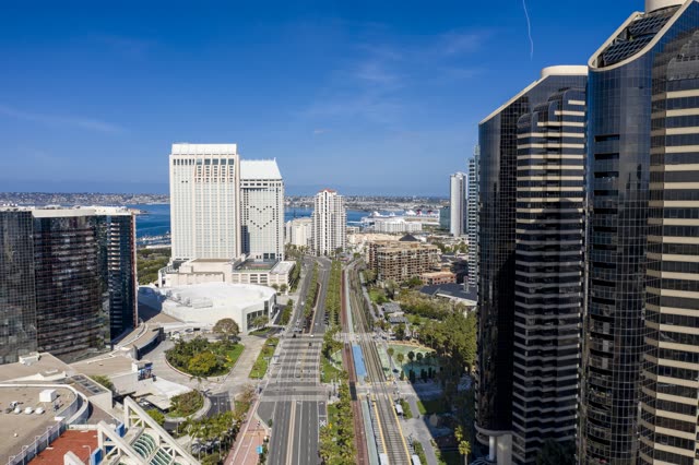 Aerial view of the downtown streets, the skyline and boats in Downtown San Diego.