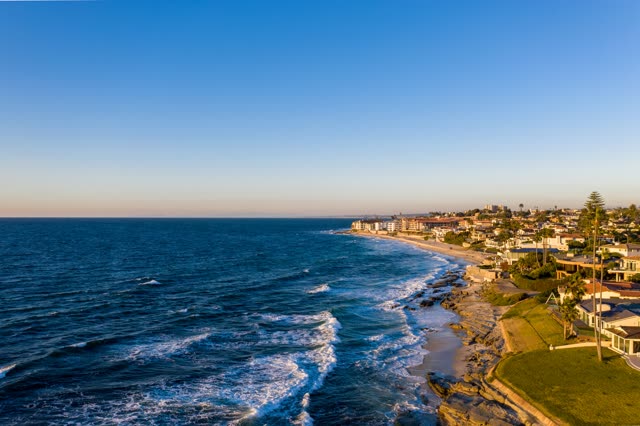 Aerial view of the beach, the surf and the ocean at Windansea.