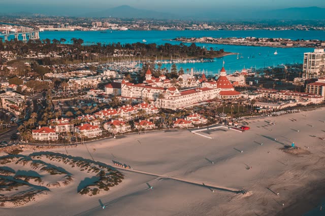 Helicopter shot of the Hotel Del Coronado and the beach – Sunset | Aerial Photo