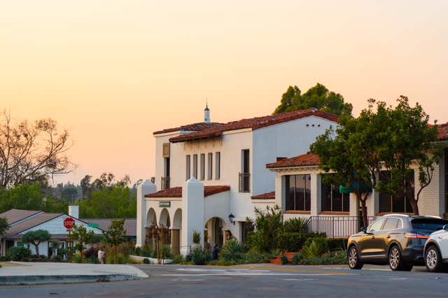 A residential street, homes and the buildings at Covenant.