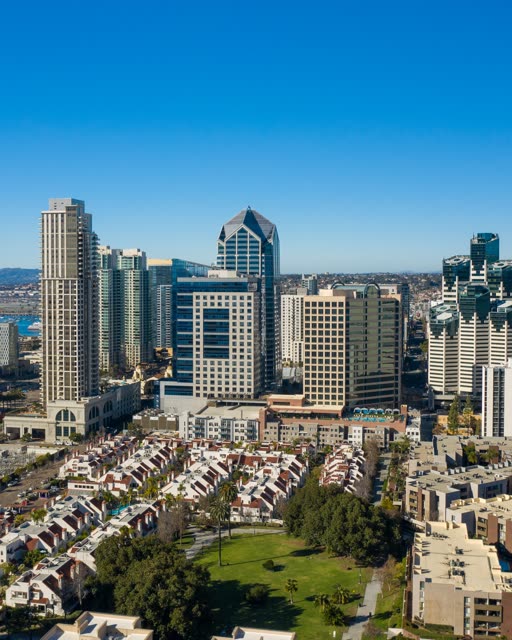 Aerial view of the downtown streets, the skyline and palm trees at San Diego Marina.