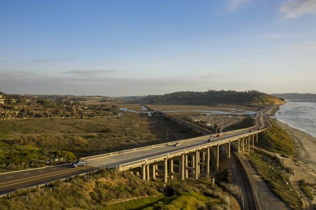 Aerial view of the country inland, the bridge and the ocean in Del Mar.