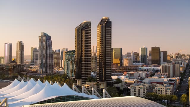Low aerial view of the downtown streets, the skyline and the buildings at Embarcadero.