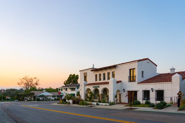 The downtown streets, homes and the buildings at Covenant, with people walking.