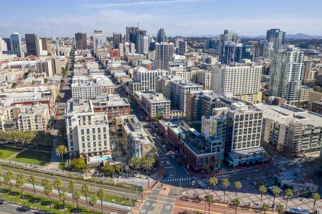 Aerial view of the downtown streets, the skyline and palm trees in Downtown San Diego.