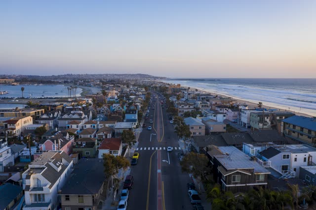 Aerial view of a residential street, the ocean and the bay in Mission Bay.