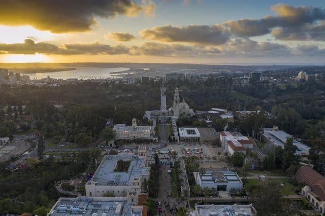 Aerial view of a park, the skyline and boats in Balboa Park.