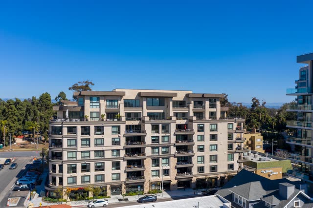 Aerial view of a residential street, homes and the buildings at Bankers Hill.