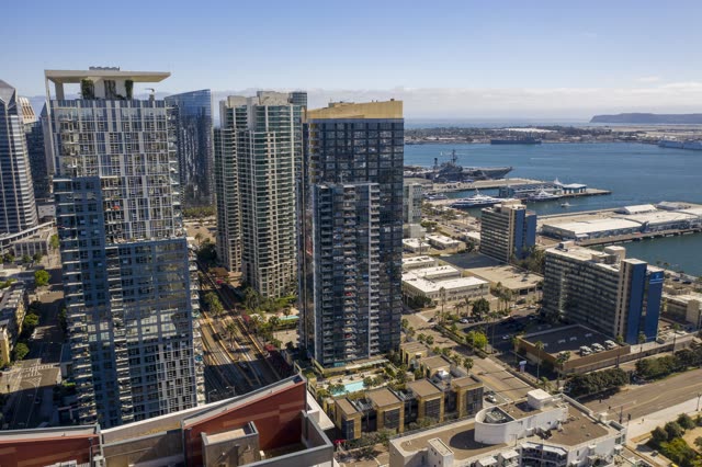 Aerial view of the downtown streets, the skyline and boats at Waterfront.