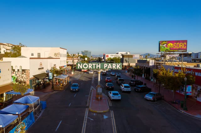 Aerial shot of the North Park sign on University Avenue | Photo – 1