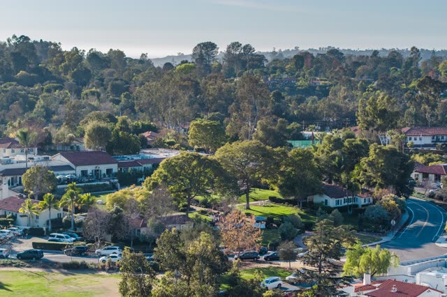 Aerial view of a residential street, homes and the buildings at Covenant.