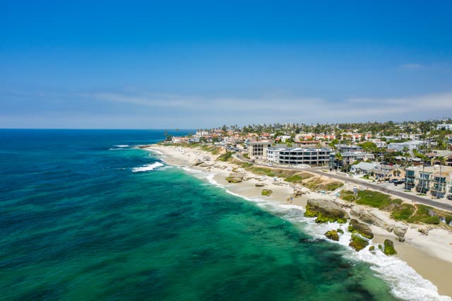 Aerial view of the beach, the surf and the ocean at Windansea.