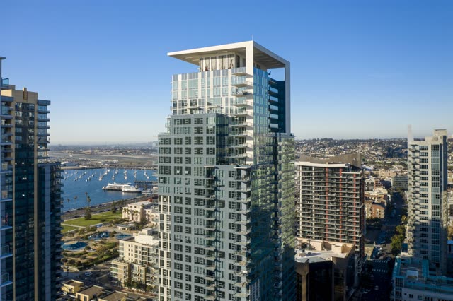Aerial view of the downtown streets, the skyline and boats at Waterfront.