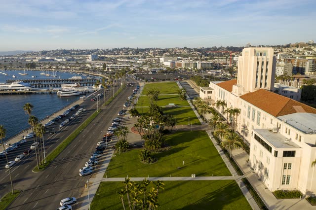 Aerial view of the downtown streets, the skyline and boats at Waterfront.