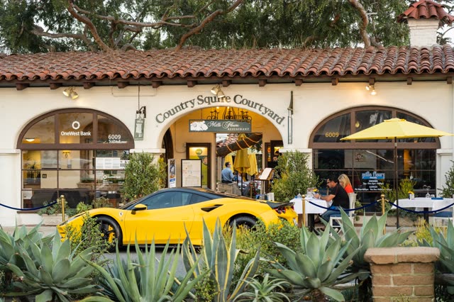 The downtown streets, homes and the buildings at Covenant, with people eating outside.