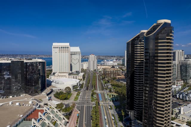 Aerial view of the downtown streets, the skyline and boats in Downtown San Diego.