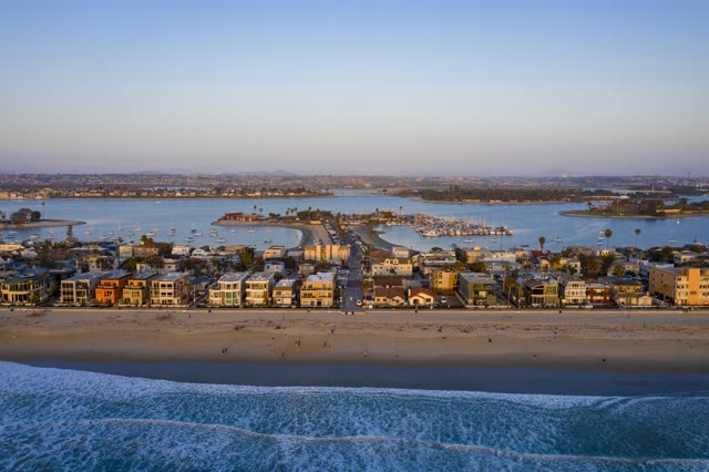 Aerial view of the beach, the surf and boats in Mission Bay.