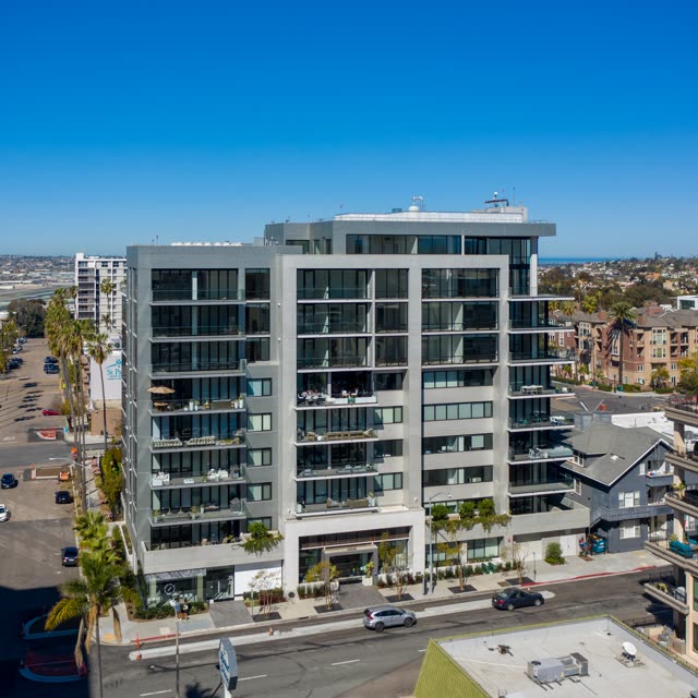 Aerial view of a residential street, palm trees and homes at Bankers Hill.