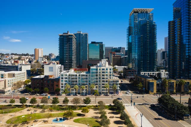 Aerial view of the downtown streets, the skyline and palm trees at Waterfront.
