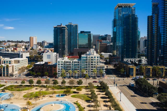 Aerial view of the downtown streets, the skyline and palm trees at Waterfront.