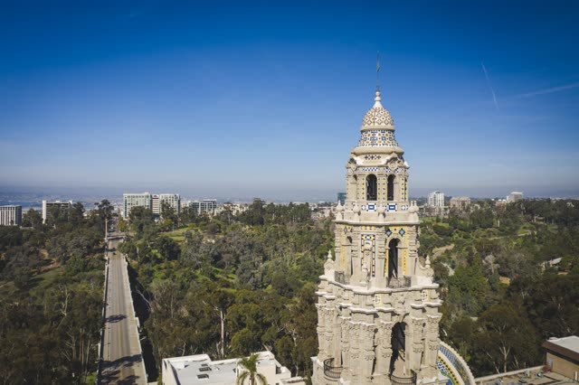 Low aerial view of a park, the buildings and the city in Balboa Park.