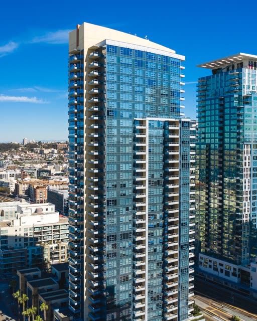 Low aerial view of the downtown streets, the skyline and the buildings at Waterfront.