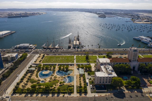 Aerial view of the harbor, boats and palm trees at Waterfront.