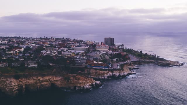Aerial view of the cliffs, the ocean and homes at La Jolla Cove.