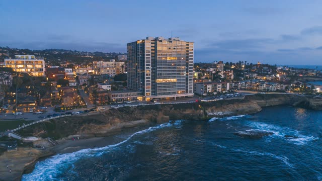 Aerial view of the cliffs, the ocean and homes at La Jolla Cove.