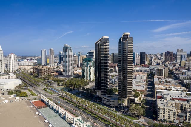 Aerial view of the downtown streets, the skyline and palm trees in Downtown San Diego.