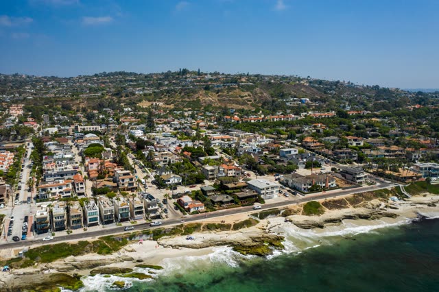 Aerial view of a residential street, the ocean and homes at Windansea.