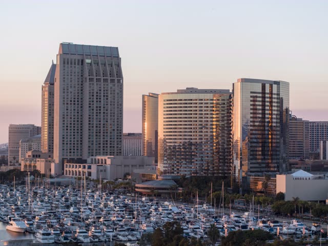 Aerial sunset shot of Downtown San Diego the Marina District the Marriott Marquis and the Manchester Grand Hyatt | Drone Photo – 3