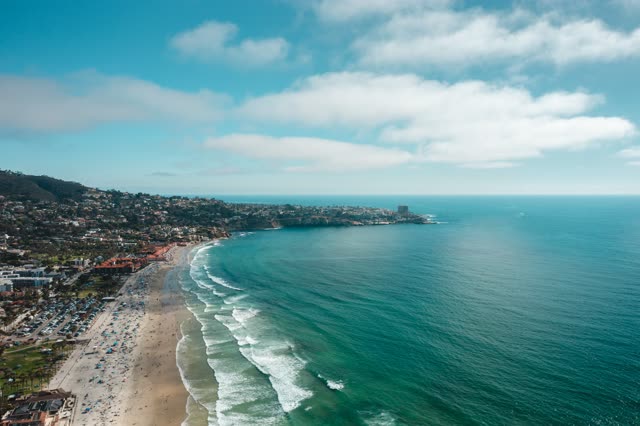Aerial view of the beach, the surf and the ocean at La Jolla Farms.