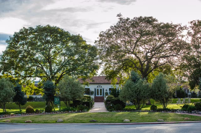 A residential street, homes and the buildings at Covenant.